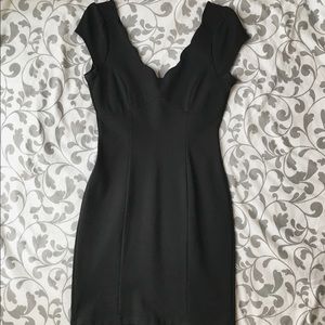 Little black dress with scalloped neckline